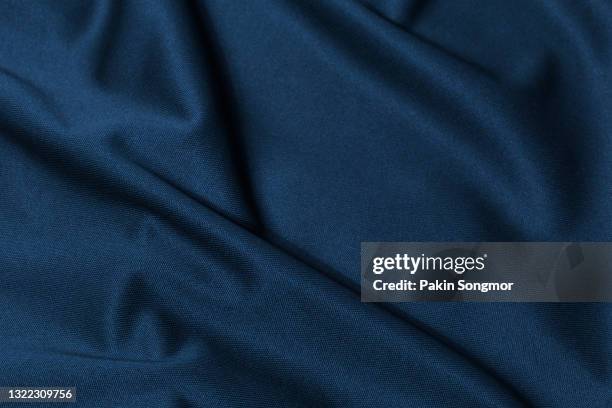 dark blue fabric cloth polyester texture and textile background. - blue fabric texture stock-fotos und bilder