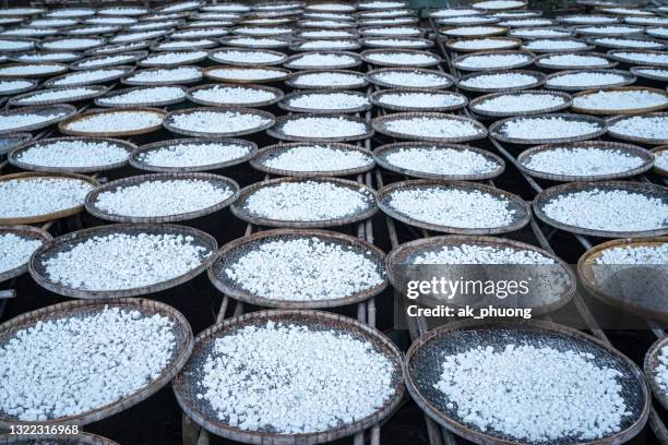 traditional alcohol yeast drying - rice production stock pictures, royalty-free photos & images