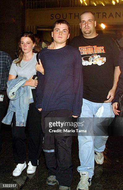 Actress Robert Iler, center, leaves Manhattan Criminal Court after posting bail with his mother Helen, left, and an unidentified man July 4, 2001 in...