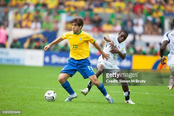 Juninho Pernambucano of Brazil and Emmanuel Pappoe of Ghana in action during the World Cup Round of 16 match between Ghana and Brazil at the...
