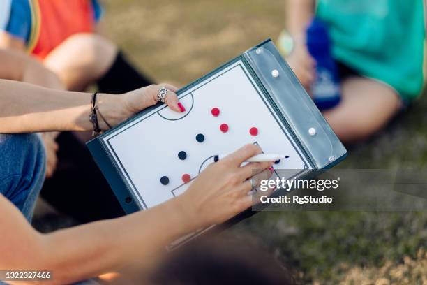 rugby coach making a play strategy - championship round three imagens e fotografias de stock