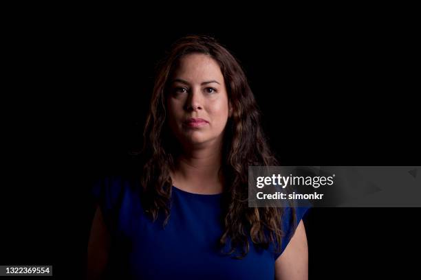 close-up of woman - portrait black background stock pictures, royalty-free photos & images