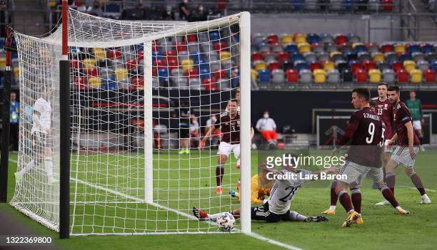Kai Havertz of Germany scores their sides fourth goal past Roberts Ozols of Latvia during the international friendly match between Germany and Latvia...