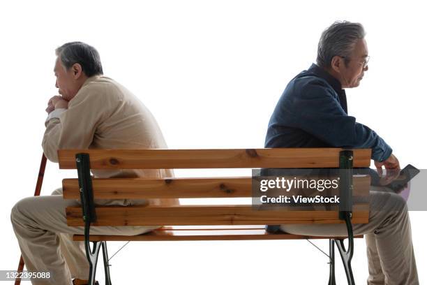 sitting on a bench in the elderly - dissent collar stock pictures, royalty-free photos & images