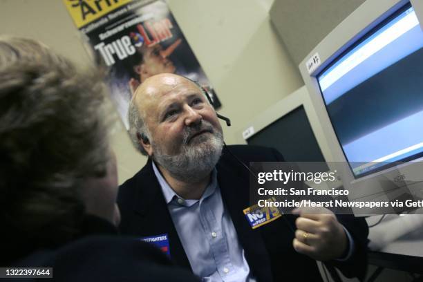 Campaign07_113_ls.jpg Rob Reiner pumps his fist after talking to a voter on the phone. Democrats are having a big rally to get out the vote, starring...