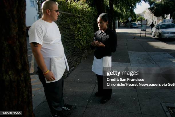 Firstcenter of plate14.jpg From left: Christian Andino and Musie Crawford talk during a break from cooking the meal at HAFP. Following 4 students...