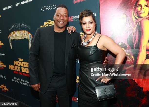 Deon Taylor and Roxanne Avent attend the Black Carpet Premiere of Hidden Empire's new film "The House Next Door: Meet the Blacks 2" at Regal LA Live:...