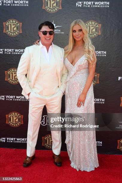 Lane Garrison and his wife Mary Kaitlin Garrison attend the Fort Worth Premiere of "12 Mighty Orphans" at ISIS Theater on June 07, 2021 in Fort...