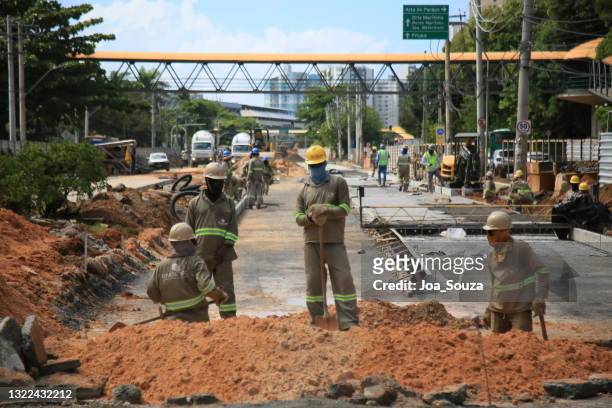 construction of an exclusive lane for brt - way foundation stock pictures, royalty-free photos & images
