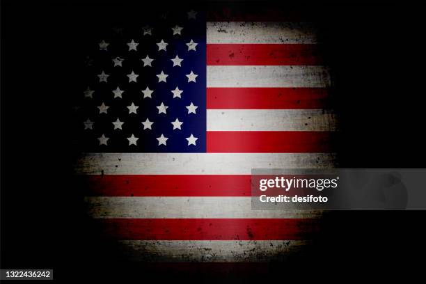 a grunge effect horizontal vector illustration of spot lit usa flag in a circular shape, over black faded frame - stars and stripes circle stock illustrations