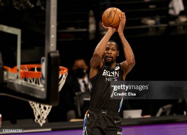 Kevin Durant of the Brooklyn Nets takes a shot in the second half against the Milwaukee Bucks during game two of the Eastern Conference second round...