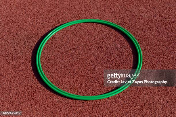 green rhythmic gymnastics hoop - world rhythmic gymnastics championship 2021 stock pictures, royalty-free photos & images