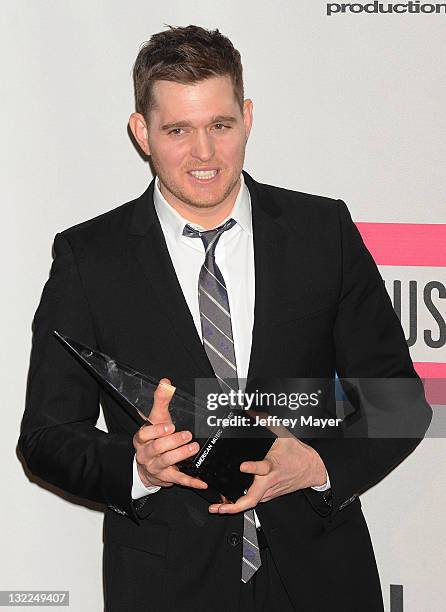 Michael Buble poses in the press room during the 2010 American Music Awards held at Nokia Theatre L.A. Live on November 21, 2010 in Los Angeles,...