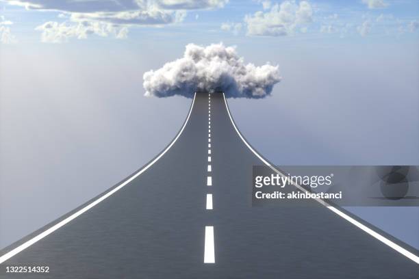 empty road to clouds - leading the way forward stock pictures, royalty-free photos & images
