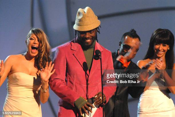 Black Eyed Peas and Jennifer Love Hewitt announce an award on stage during the 48th Annual Grammys awards, February 7, 2006 in Los Angeles,...