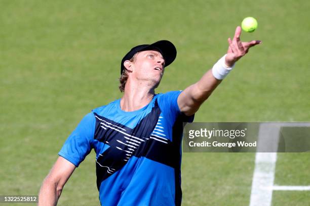 Kevin Anderson of South Africa serves against Jay Clarke of Great Britain during Day 4 of the Viking Nottingham Open at Nottingham Tennis Centre on...