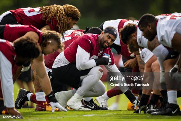Jonathan Allen of the Washington Football Team participates in a drill during minicamp at Inova Sports Performance Center on June 8, 2021 in Ashburn,...