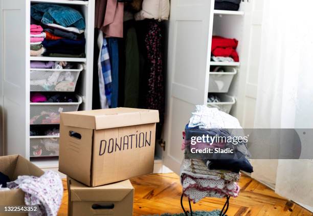 donation boxes - wardrobe organisation stock pictures, royalty-free photos & images