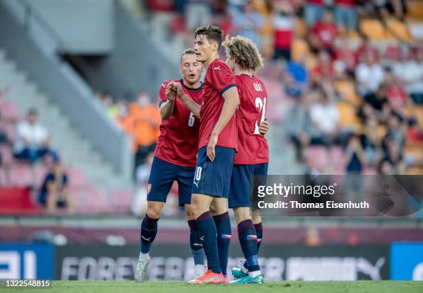 Patrik Schick of the Czech Republic celebrates with Vladimir Coufal and Alex Kral after scoring his team's first goal during the international...