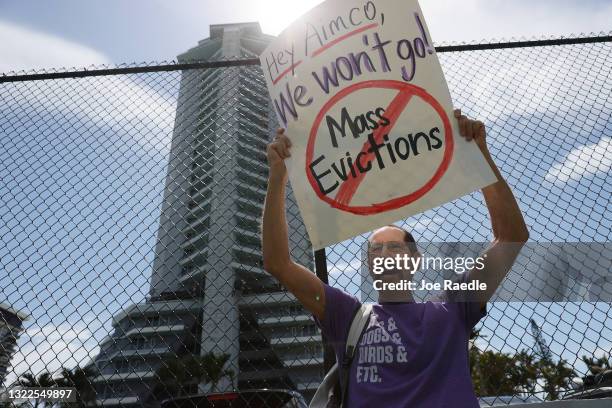 Steven Leidner and other tenants of the Hamilton on the Bay apartment building protest eviction notices on June 08, 2021 in Miami, Florida....