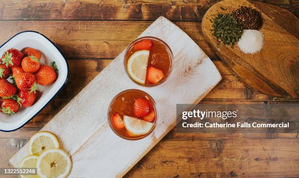 top down image of cocktails on a chopping board - cocktail and mocktail stock pictures, royalty-free photos & images
