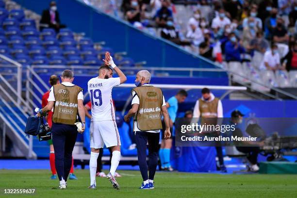 Karim Benzama of France exits after an injury during the international friendly match between France and Bulgaria at Stade de France on June 08, 2021...