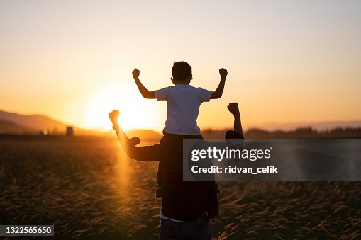 Dad and son outdoors