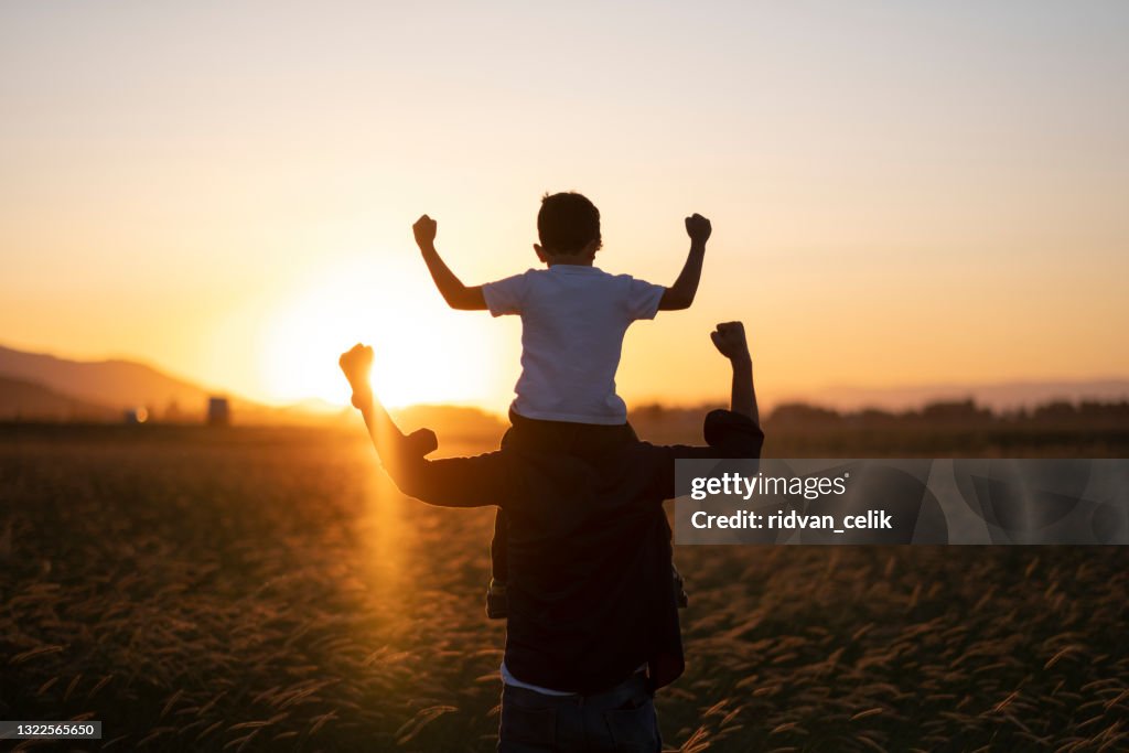 Dad and son outdoors