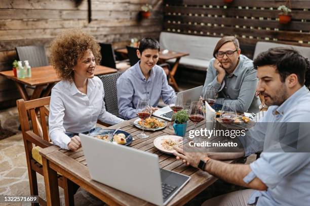 different location, better productivity - business lunch stock pictures, royalty-free photos & images