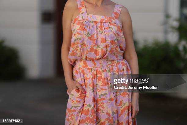 Anna Wolfers wearing colorful midi dress via Goldig Shop on May 31, 2021 in Hamburg, Germany.
