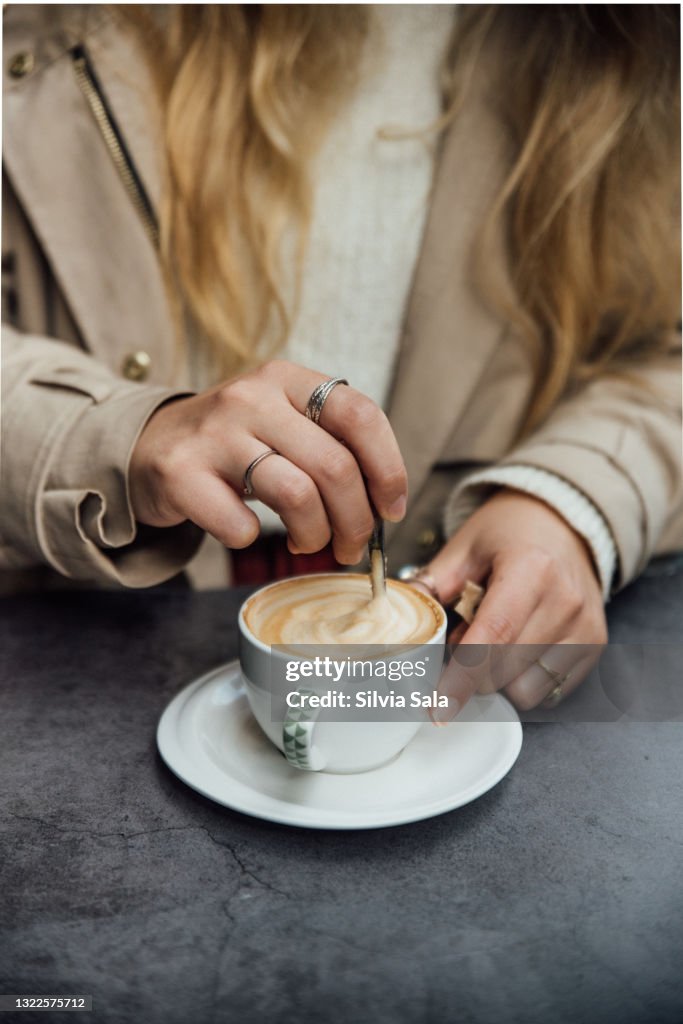Italian Girl drinking Cappuccino