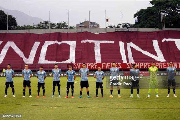 Players of Uruguay line up prior to a match between Venezuela and Uruguay as part of South American Qualifiers for Qatar 2022 at Estadio Olímpico on...