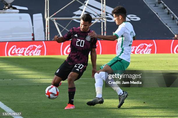 Eduardo Aguirre of Mexico fights for the ball with Abdulbasit Mohammed of Arabia Saudita during the international friendly match between Mexico U23...