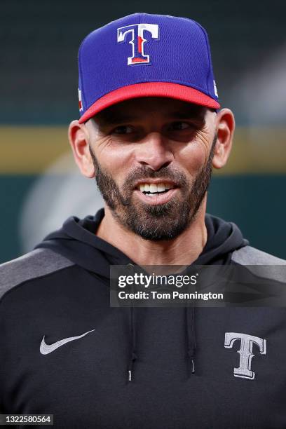 Manager Chris Woodward of the Texas Rangers talks with the media during batting practice before taking on the San Francisco Giants at Globe Life...