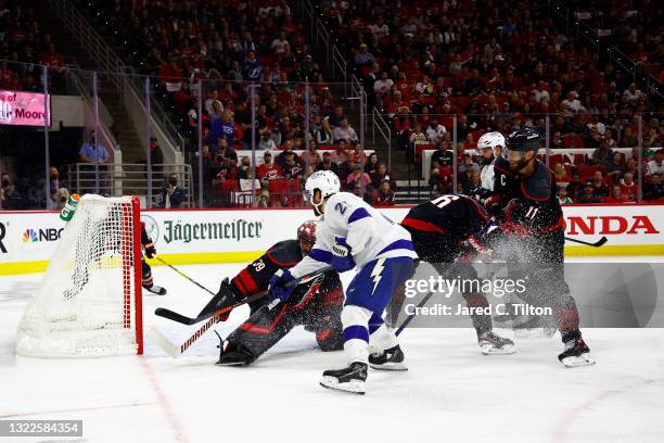 Brayden Point of the Tampa Bay Lightning shoots and scores against Alex Nedeljkovic of the Carolina Hurricanes during the second period in Game Five...