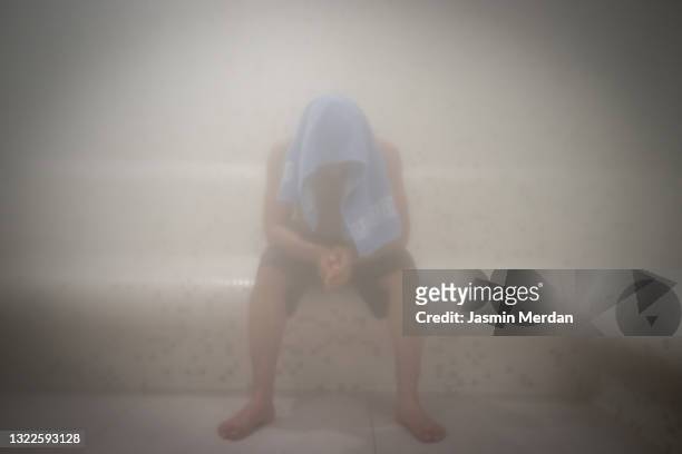 man in steam room sauna - sauna stock pictures, royalty-free photos & images