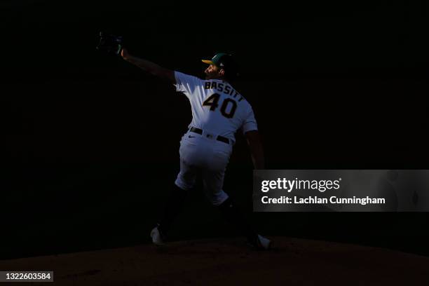 Chris Bassitt of the Oakland Athletics pitches in the top of the first inning against the Arizona Diamondbacks at RingCentral Coliseum on June 08,...