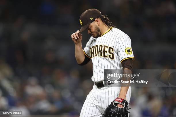 Dinelson Lamet of the San Diego Padres looks on after being pulled from the game during the sixrth inning of a game against the Chicago Cubs at PETCO...