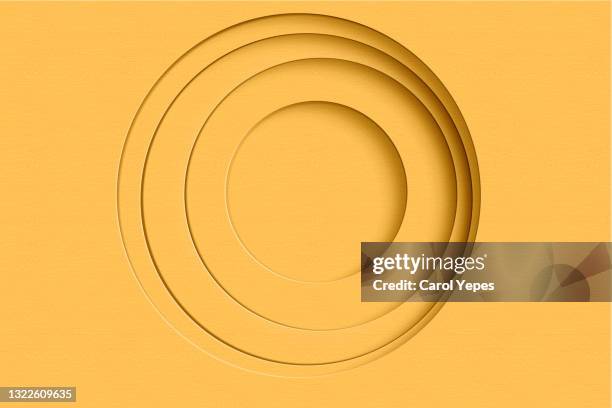 abstract yellow circles paper background - naranja color fotografías e imágenes de stock
