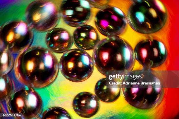 abstract motion blur of metal beads - bearings metal stock pictures, royalty-free photos & images