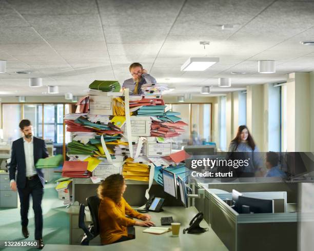 paperless office - heavy load stock pictures, royalty-free photos & images