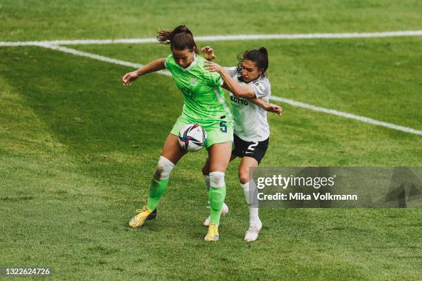 Lena Sophie Oberdorf of Wolfsburg challenges Leticia Santos de Oliveira during the Women's DFB Cup Final match between Eintracht Frankfurt and VfL...