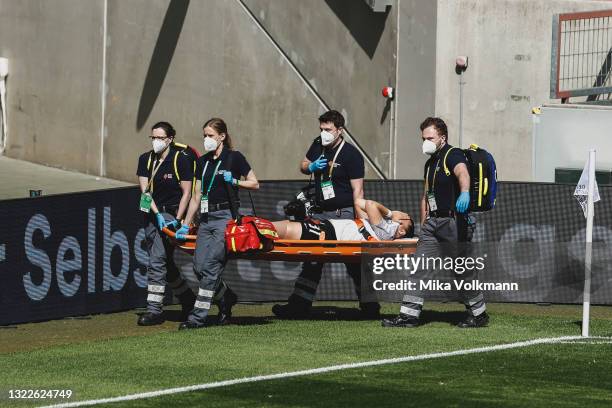 Tanja Pawollek fo Frankfurt injured during the Women's DFB Cup Final match between Eintracht Frankfurt and VfL Wolfsburg at RheinEnergieStadion on...