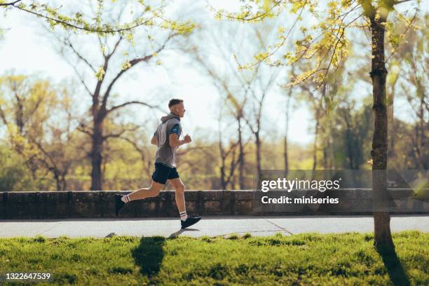 Running In Spring 4,722 Man Jogging Spring Stock Photos, High-Res Pictures, and Images ...