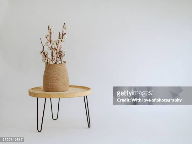 scandinavian white interior modern decoration, scandi table with jute vase and cotton banches on white background - table basse photos et images de collection
