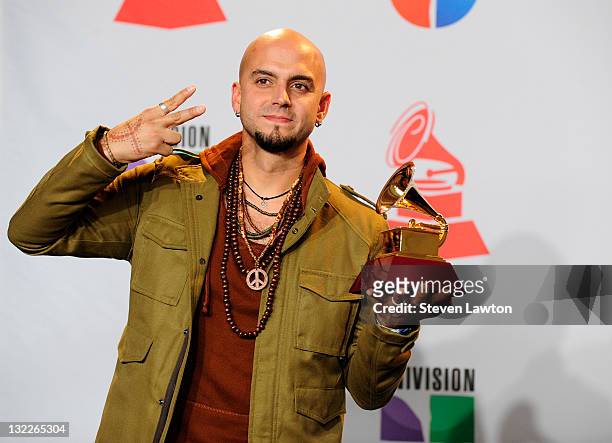 Musician Sie7e, winner of Best New Artist, poses in the press room during the 12th annual Latin GRAMMY Awards at the Mandalay Bay Resort & Casino on...