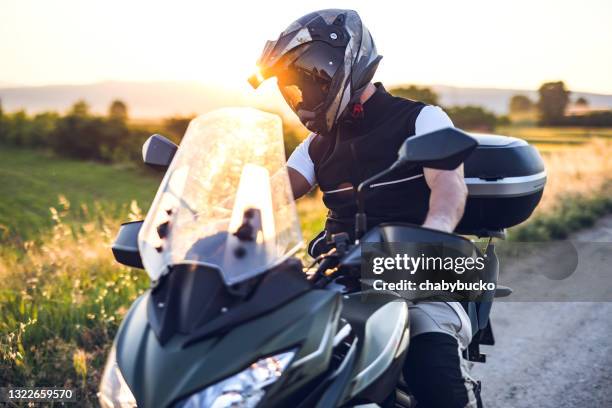 Happy Motorcycle Rider Happy Motorcycle Rider Photos and Premium High Res Pictures - Getty Images