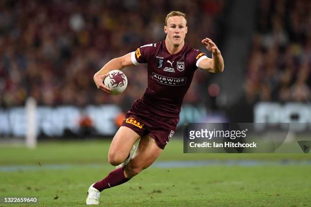 Daly Cherry-Evans of the Maroons runs the ball during game one of the 2021 State of Origin series between the New South Wales Blues and the...