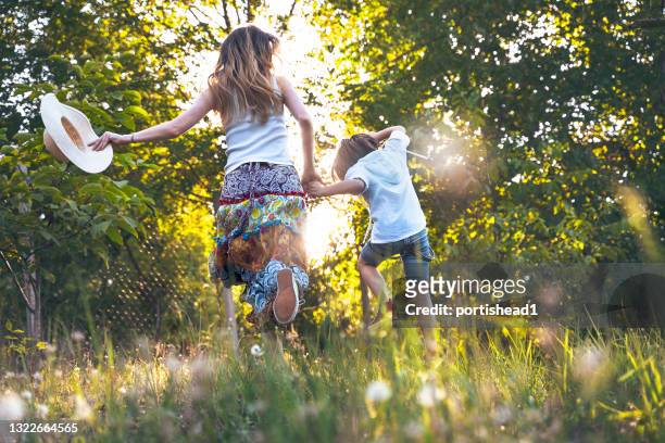 happy family enjoying the good weather - hot boy pics stock pictures, royalty-free photos & images
