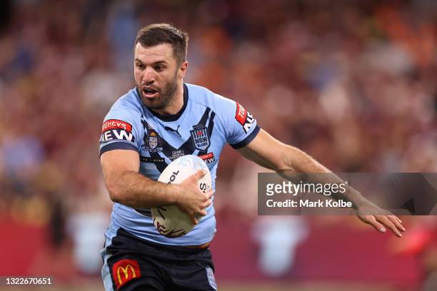 James Tedesco of the Blues makes a break during game one of the 2021 State of Origin series between the New South Wales Blues and the Queensland...
